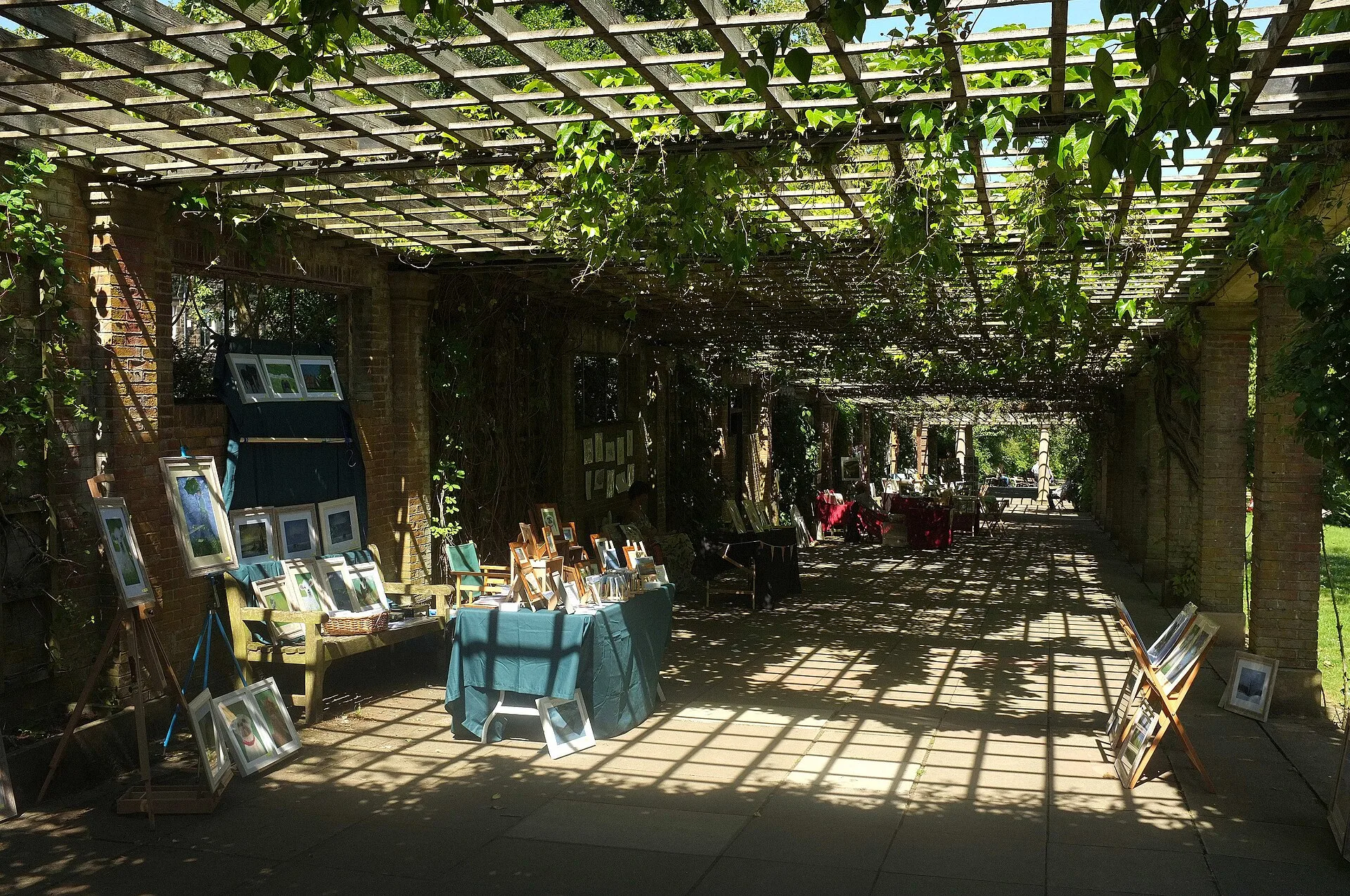 Sunlight falling through the pergola roof of the Sun Colonnade in Valley Gardens